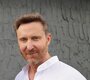 News-Titelbild - Für den treibenden neuen Remix von "Crazy What Love Can Do" war David Guetta mit James Hype im Studio